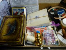 Box of crafter's materials including a Blue Bird toffee tin stuffed with buttons