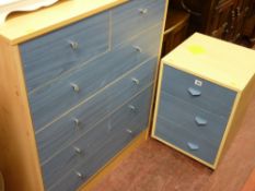 Modern light wood and blue stained chest of two short over four long drawers and a similar bedside