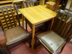 Square topped kitchen table and three vintage oak dining chairs