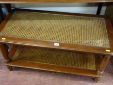 Two tier coffee table with glass and canework top and cane undershelf
