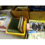 Quantity of mixed books in several boxes