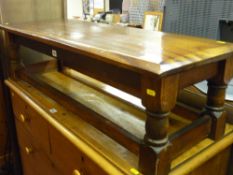 Wooden coffee table and a reproduction tripod wine table