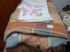 Vintage colourful blanket and an embroidered cloth
