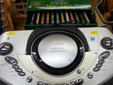 Portable CD player and a selection of CDs E/T