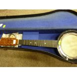 Cased vintage banjo (for restoration), the skin with unverified signature of George Formby