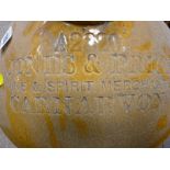 Large sized stoneware flagon 'Jones & Price, Wine & Spirit Merchants, Carnarvon'