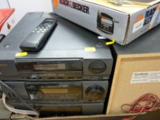 Boxed Black & Decker electric jigsaw and a Goodmans stereo system E/T
