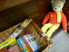 Basket of miscellaneous children's games, Rupert the Bear soft toy etc