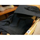 Graduation hat by Ravenscroft of London and a gown