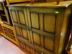 Priory style two door cupboard with base fall front section