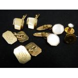 Pair of oblong nine carat gold cufflinks with canted corners, initialled 'J G J', 12.5 grms, another