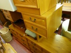 Medium wood effect bedroom suite comprising dressing table, pair of narrow chests, pair of two