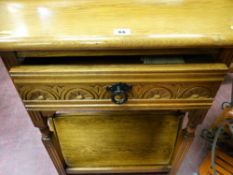Polished hall table with upper carved front drawer