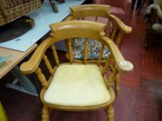 Pair of modern light wood captain's style chairs