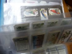 Ring binder containing cigarette card collection, first day covers etc