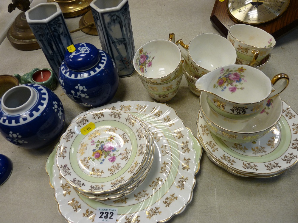 Pair of Prunus Blossom ginger jars, pair of blue and white chimney vases, quantity of Staffs teaware