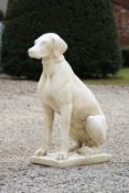 Gartenfigur.Sitzender Jagdhund auf rechteckigem Sockel. Steinguss. H: 74 cm. 20.00 % buyer's premium