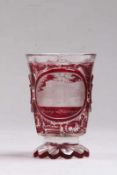 Badeglas.Böhmen 19. Jh. Farbloses, mundgeblasenes Glas, roter Überfang und Lasur. Facettierter