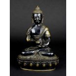 Buddha, Tibet, 1.H.20.Jh., Bronze dunkel patiniert, Bodhisattva in meditierender Haltung auf einem