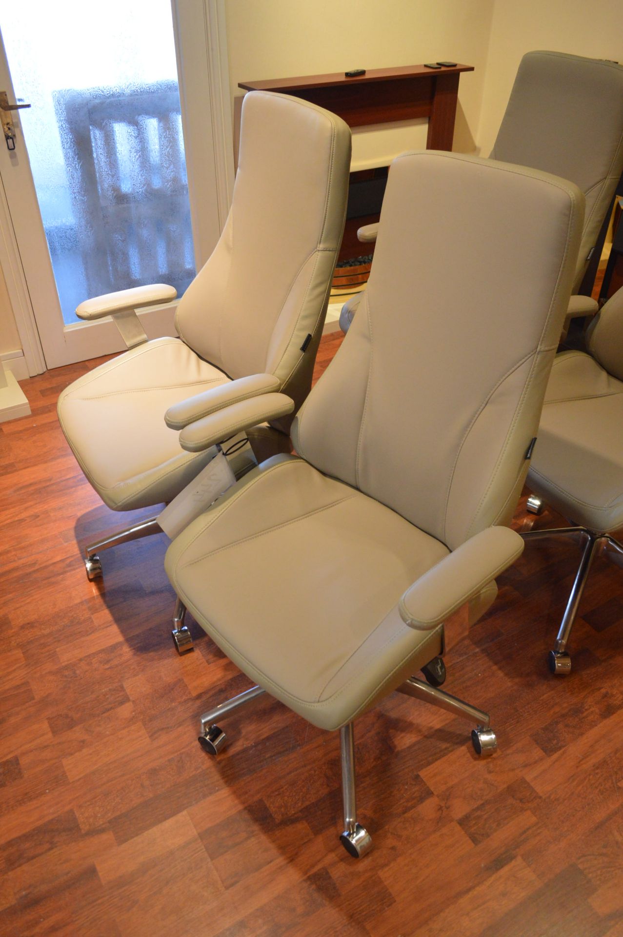 Two Staples Grey Leatherette Upholstered Swivel Armchairs (lot located at Unit 3 Glover Centre,