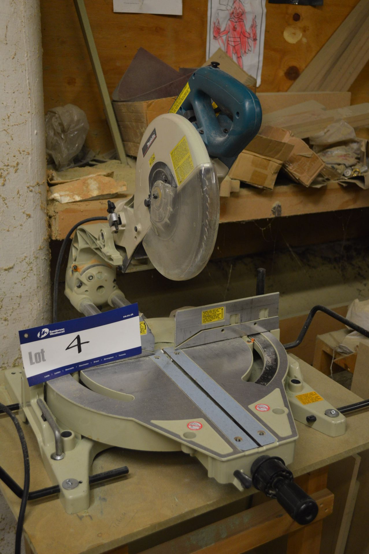 Makita LS1013 Bench Top Mitre Saw, 240V, with timber stand (lot located at Vale Mill, Micklehurst