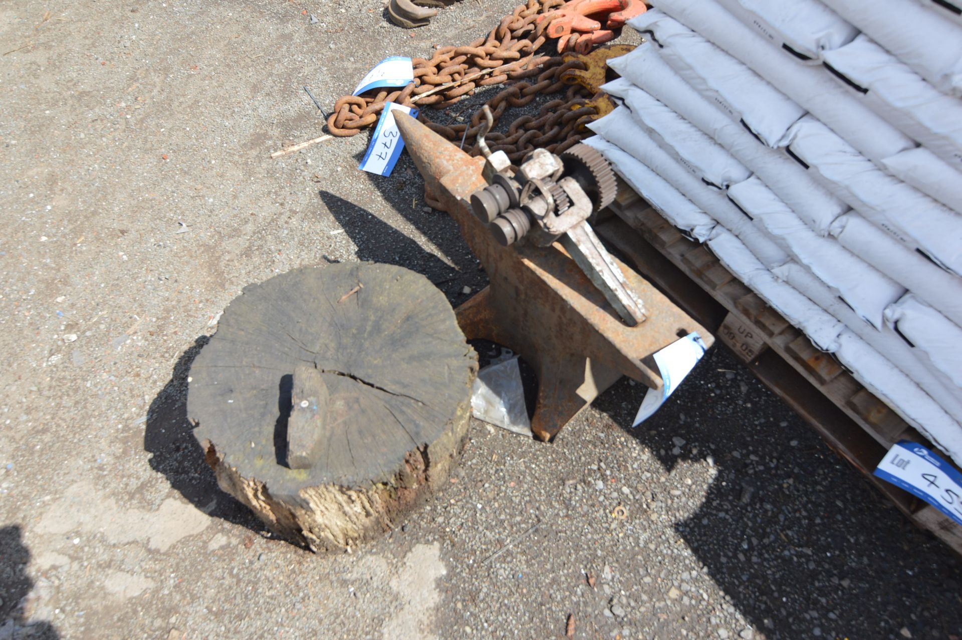 Anvil, with swaging block and timber stand