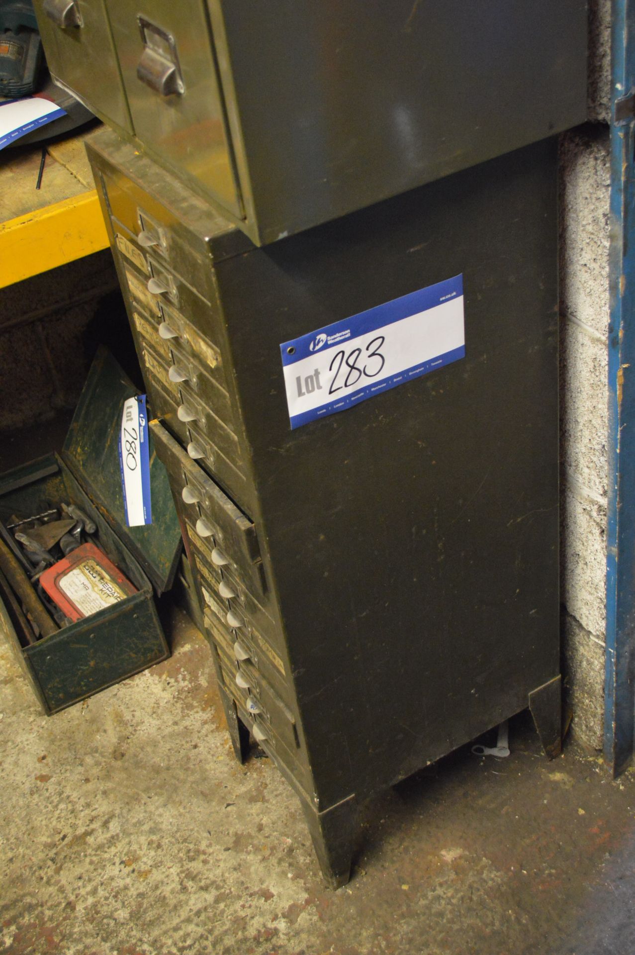 Multi Drawer Steel Cabinet, with contents including taps and equipment