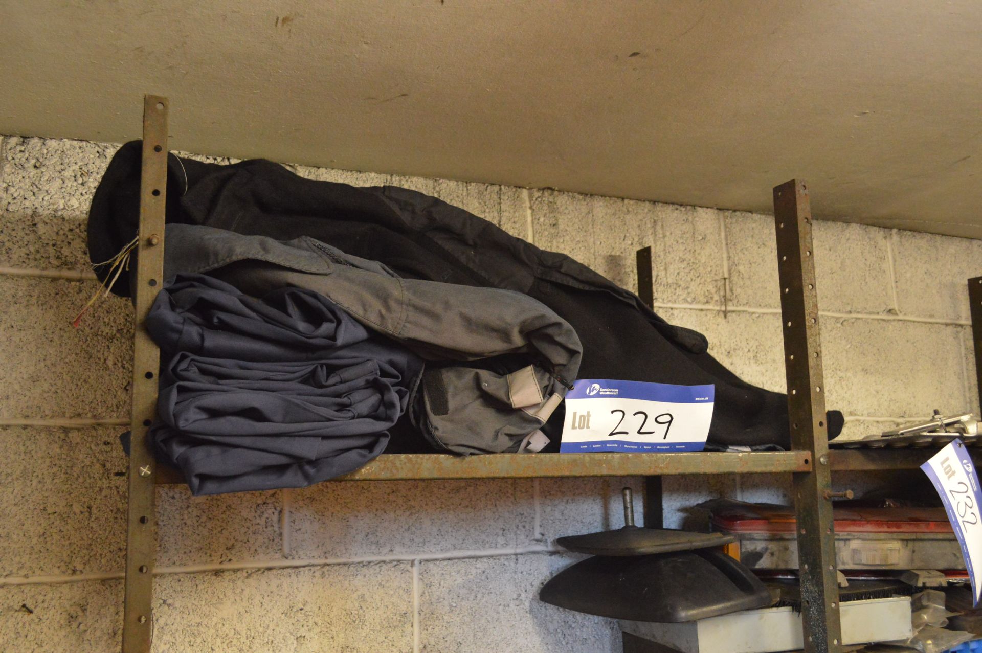 Overalls and Coats, on one shelf of rack