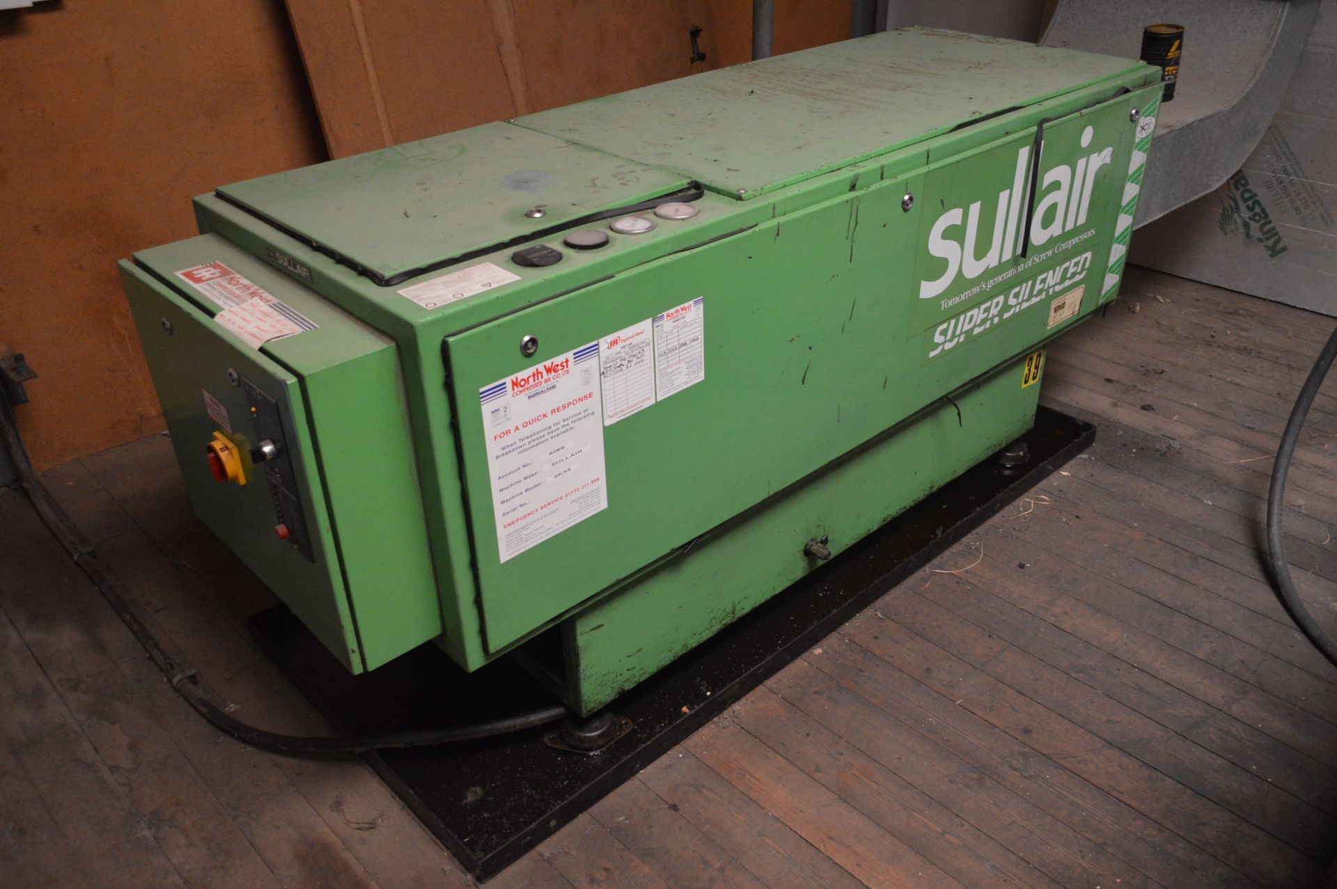 Sullair SK55 PACKAGE AIR COMPRESSOR, indicated hours 21,495 (at time of listing), with ducting to