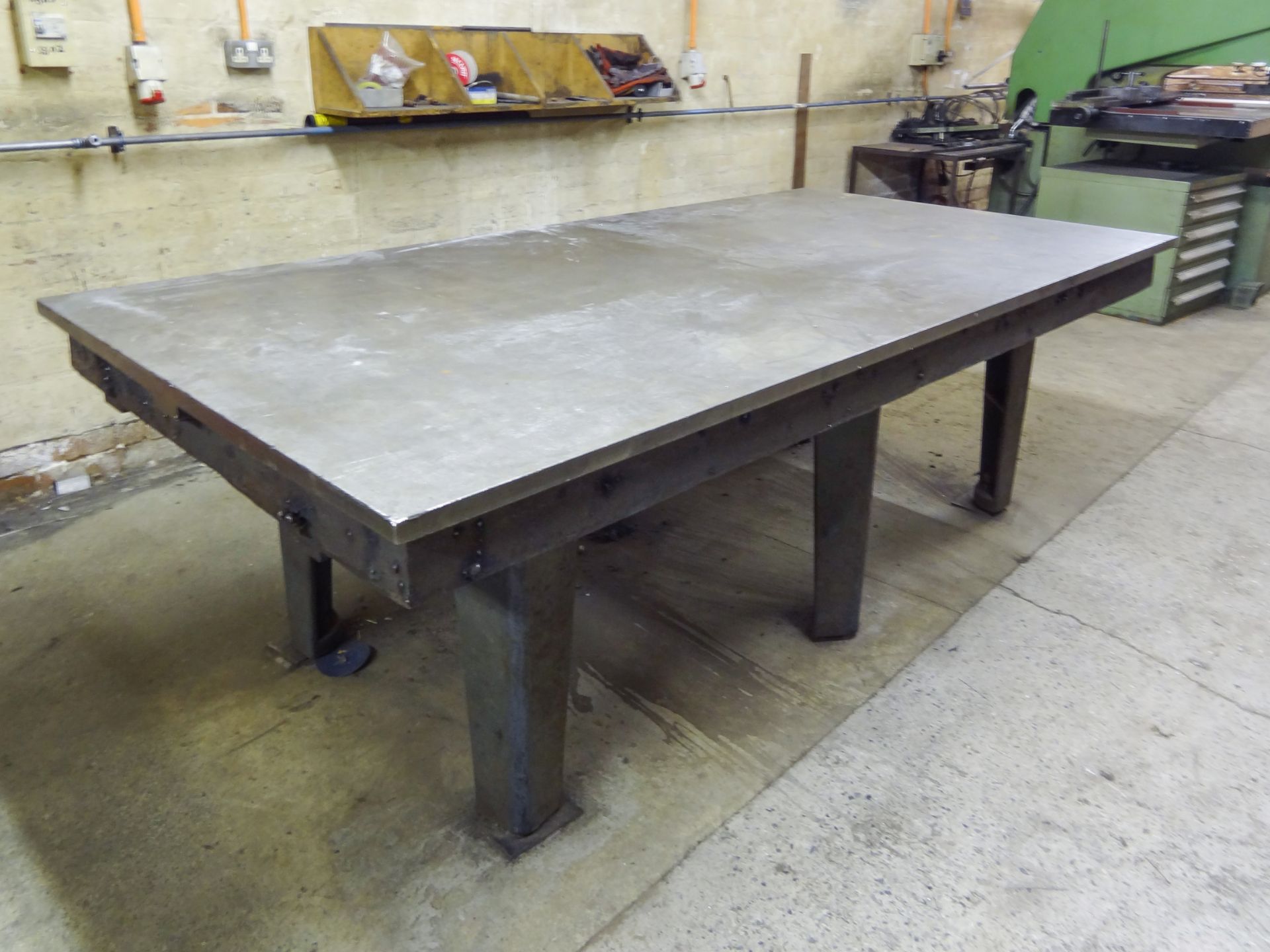 Surface Table (used as a welding bench), 30mm thick steel top, integral six legged steel frame and