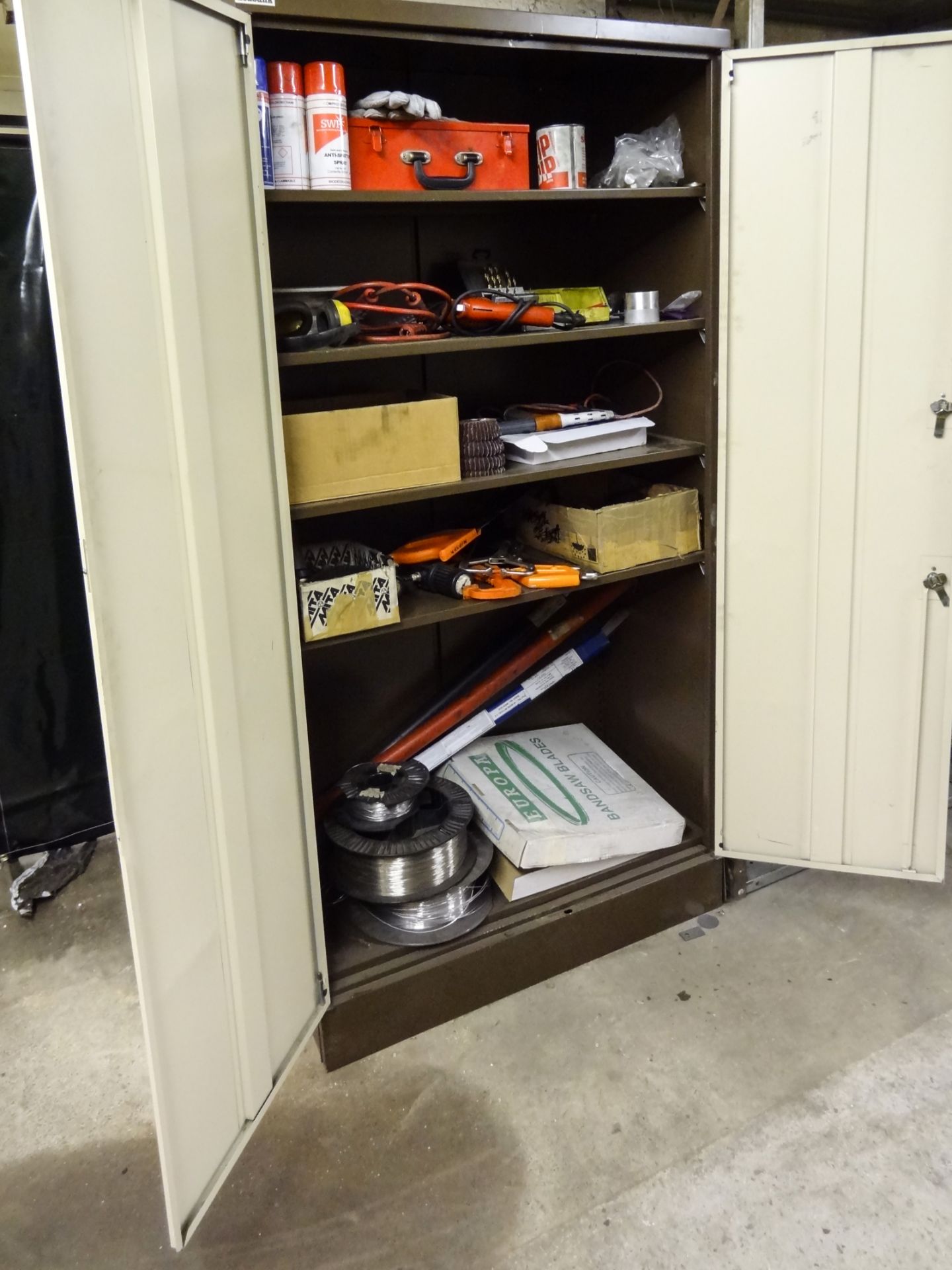 Two Steel Cupboards, with hinged doors, containing power and hand tools, parts and consumables