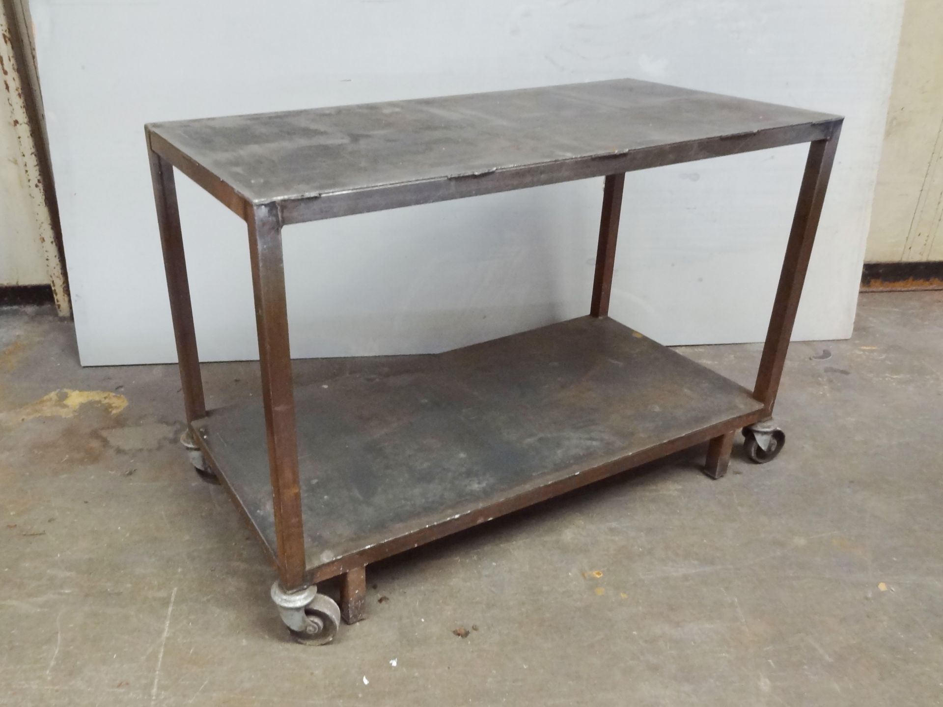 Three Heavy Duty Work Trolleys each with steel top and base shelf, approx. 1.25m x 625mm