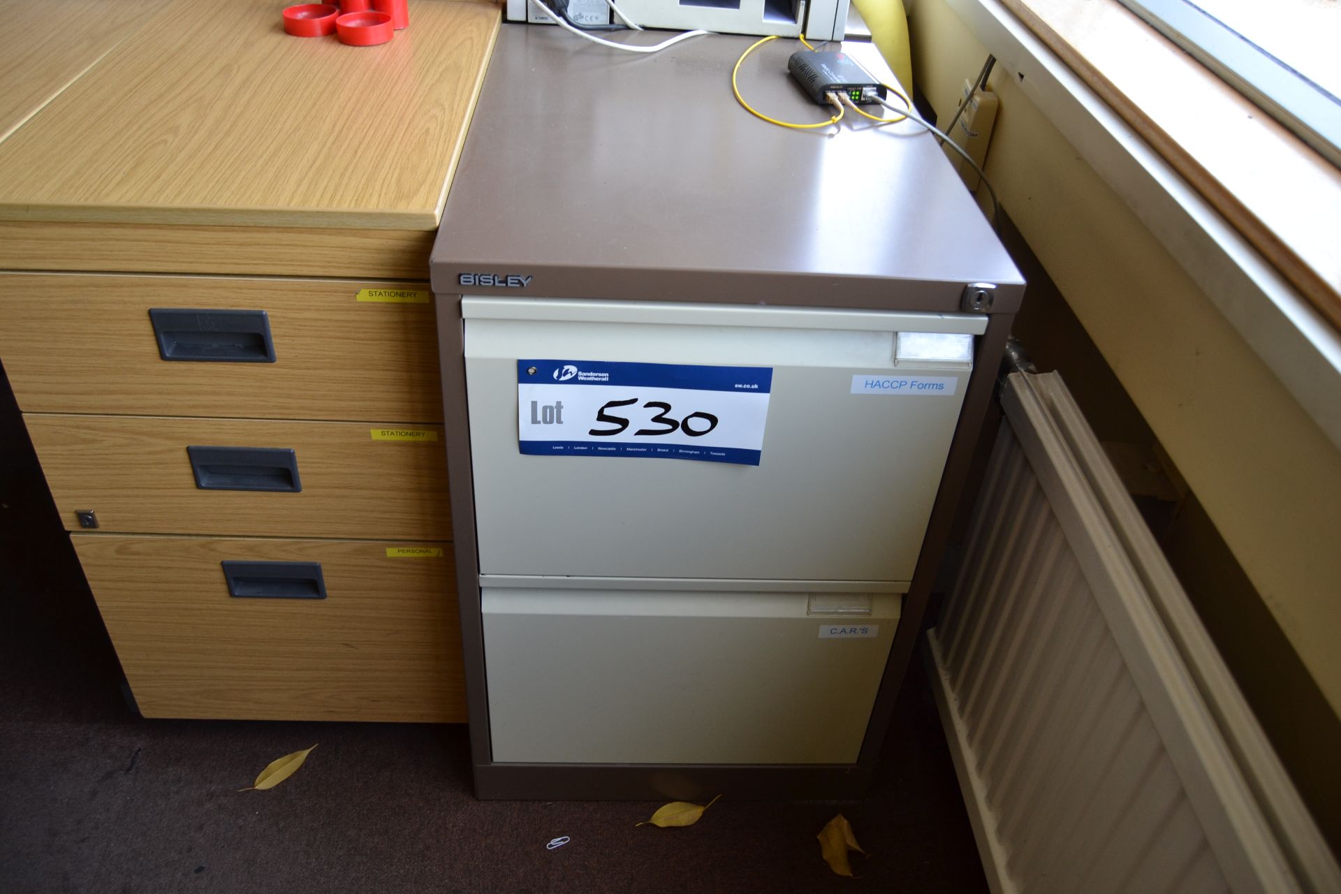 Two Metal Four Drawer Filing Cabinets