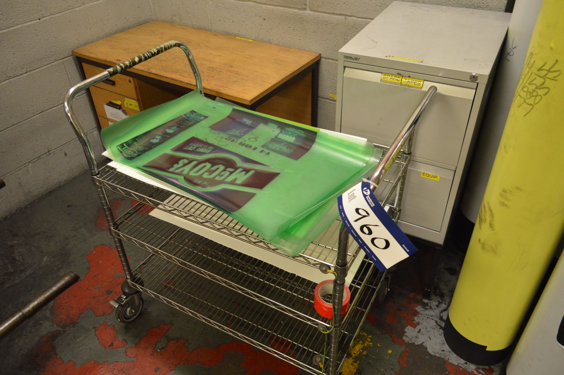 Desk, two drawer filing cabinet, metal rack and tr