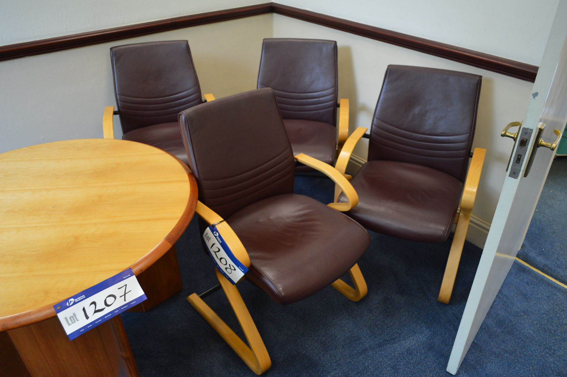 Four Leather Upholstered Wood Framed Armchairs