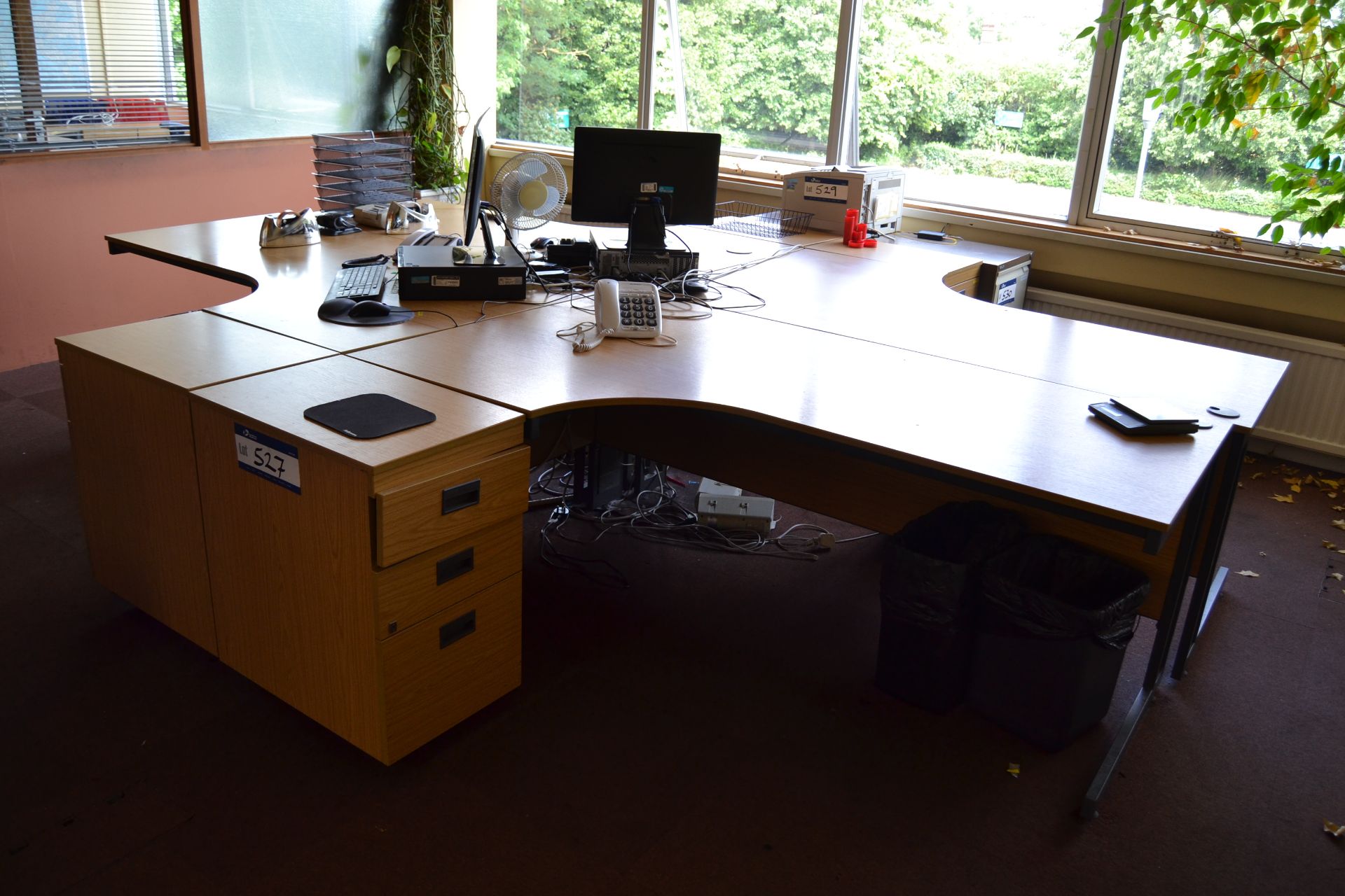 Four Light Oak Veneer Shaped Desks, with four pede