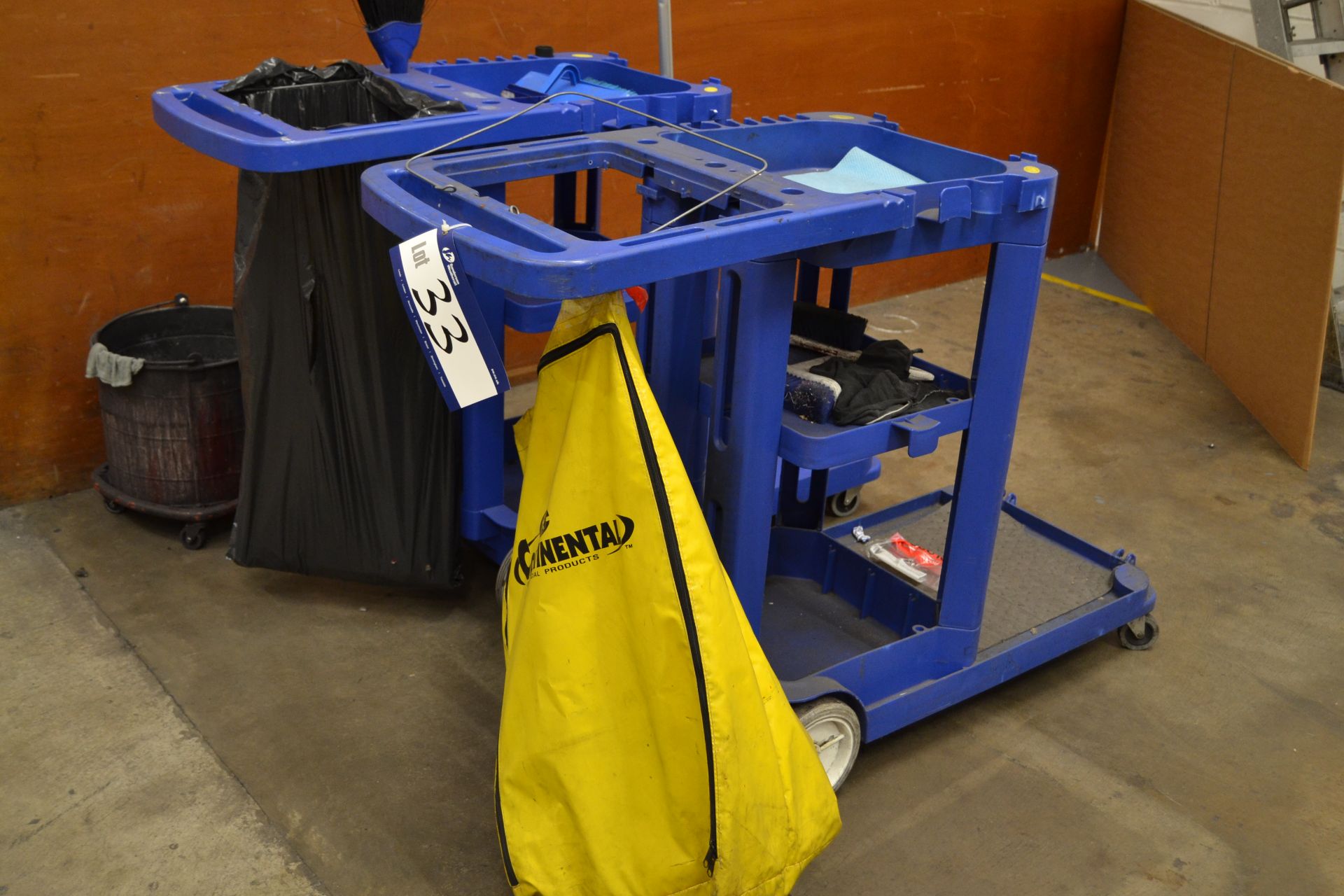 Two Cleaners Carts and Three Tub Vacuum Cleaners