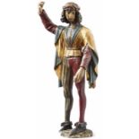 Höfling Um 1500 Auf Natursockel stehende männliche Figur in Schnabelschuhen, Mi-Parti-