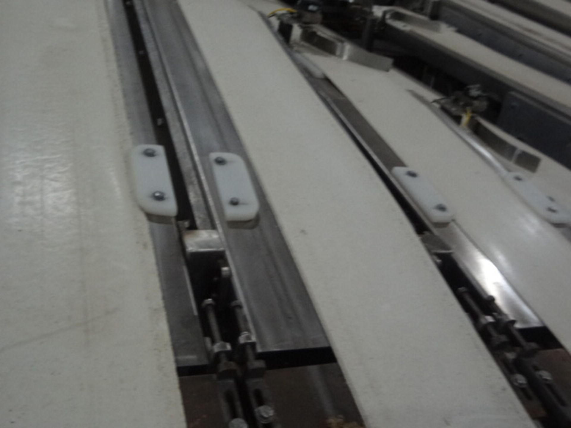 Adjustable 4 Lane 8 in. x 147 in. Long Conveyor, LOCATED IN OTTAWA, OH. LOADING FEE $250