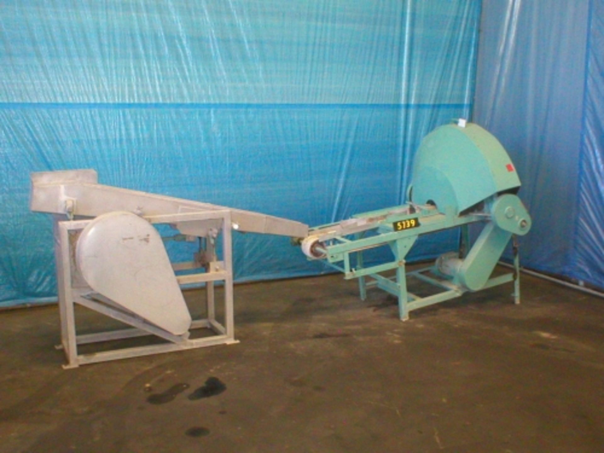 San Jose Peach slicer, currently set with three blades, can be increased per customer requirement,