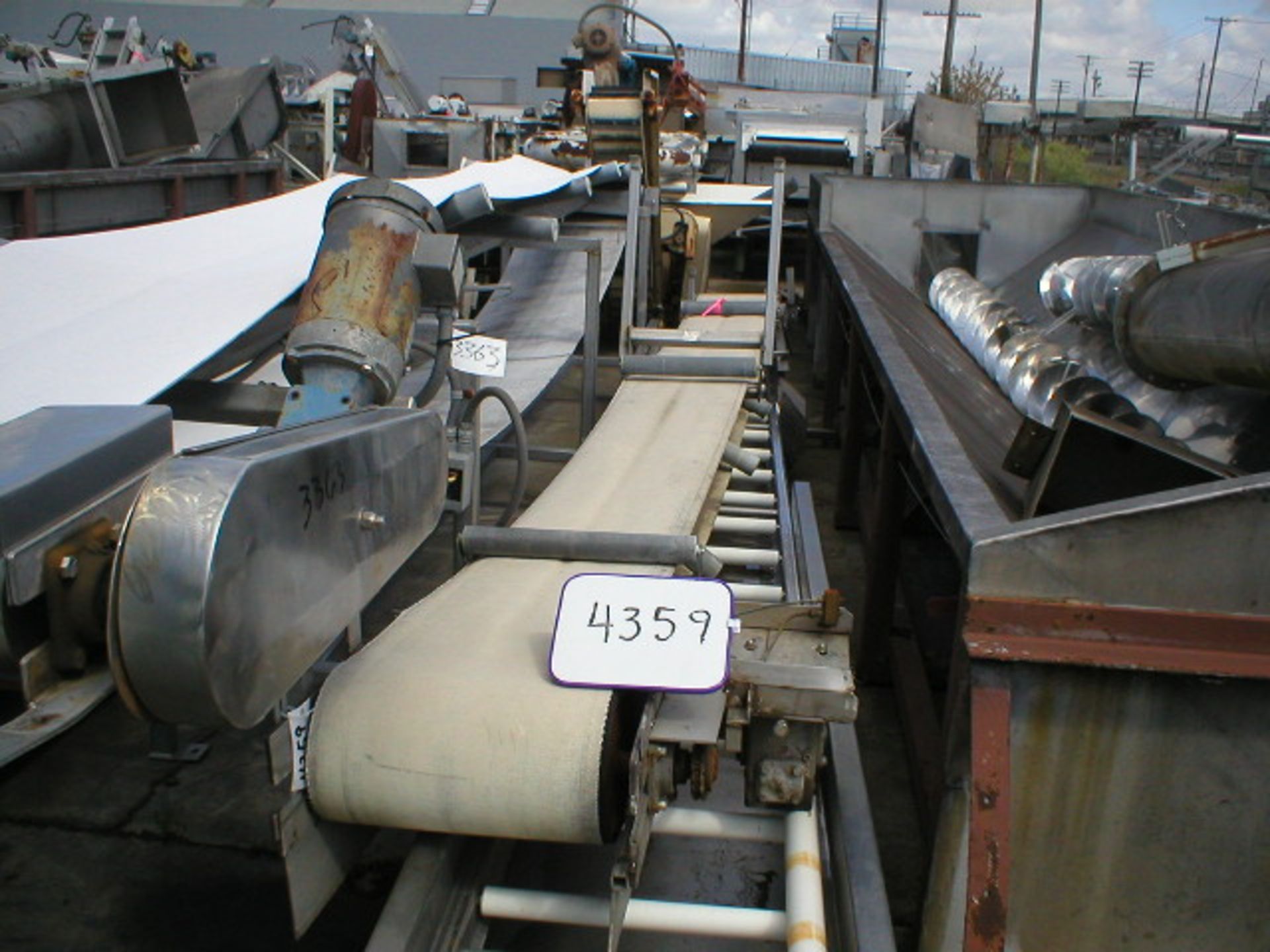 18 in. wide x 19 ft. long stainless steel rabbit ear conveyor, 3/4hp chain drive, stainless steel