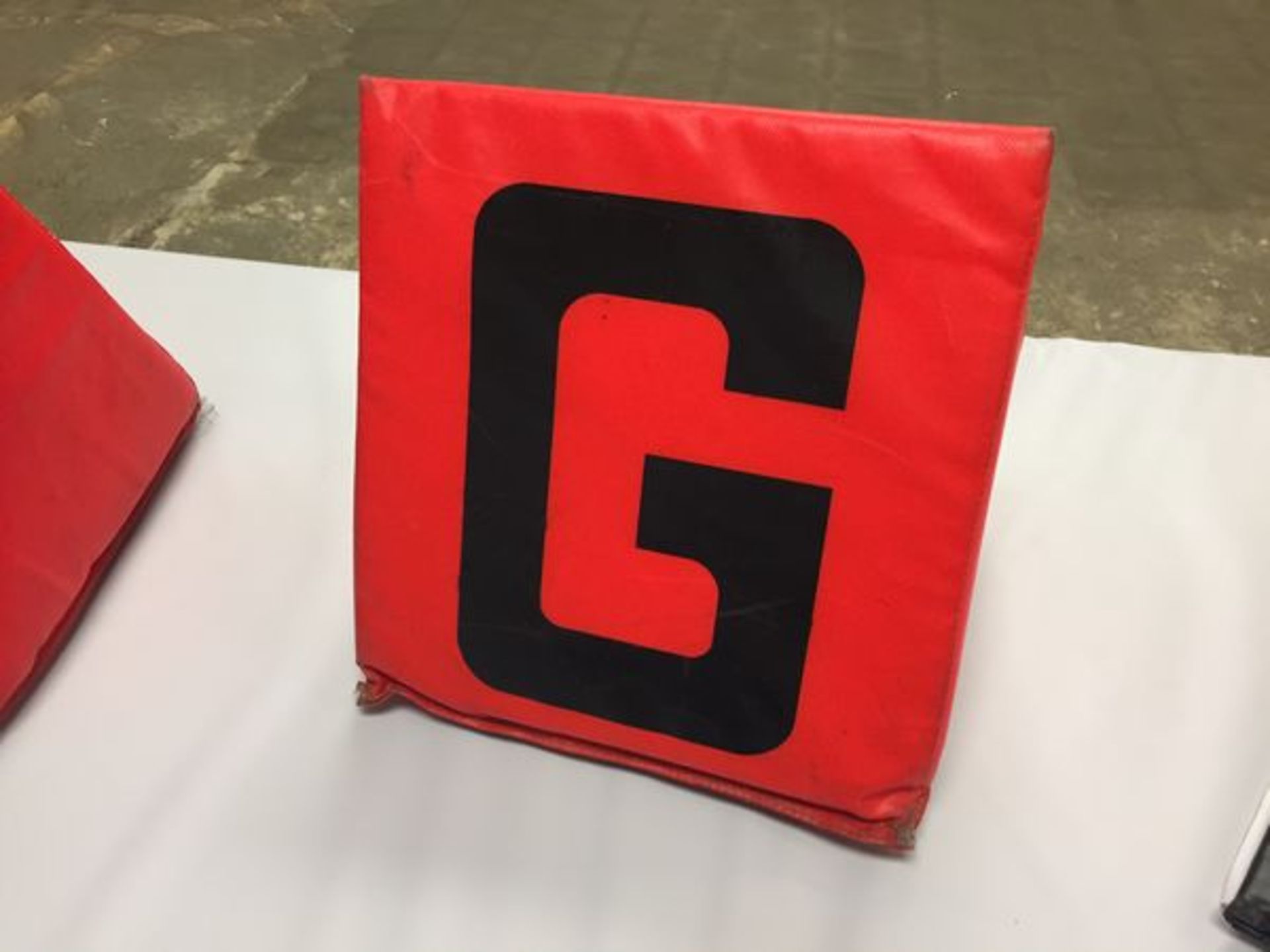 G yard"" Sideline Marker / Game-Used / This item includes Georgia Dome Authentication Tag
