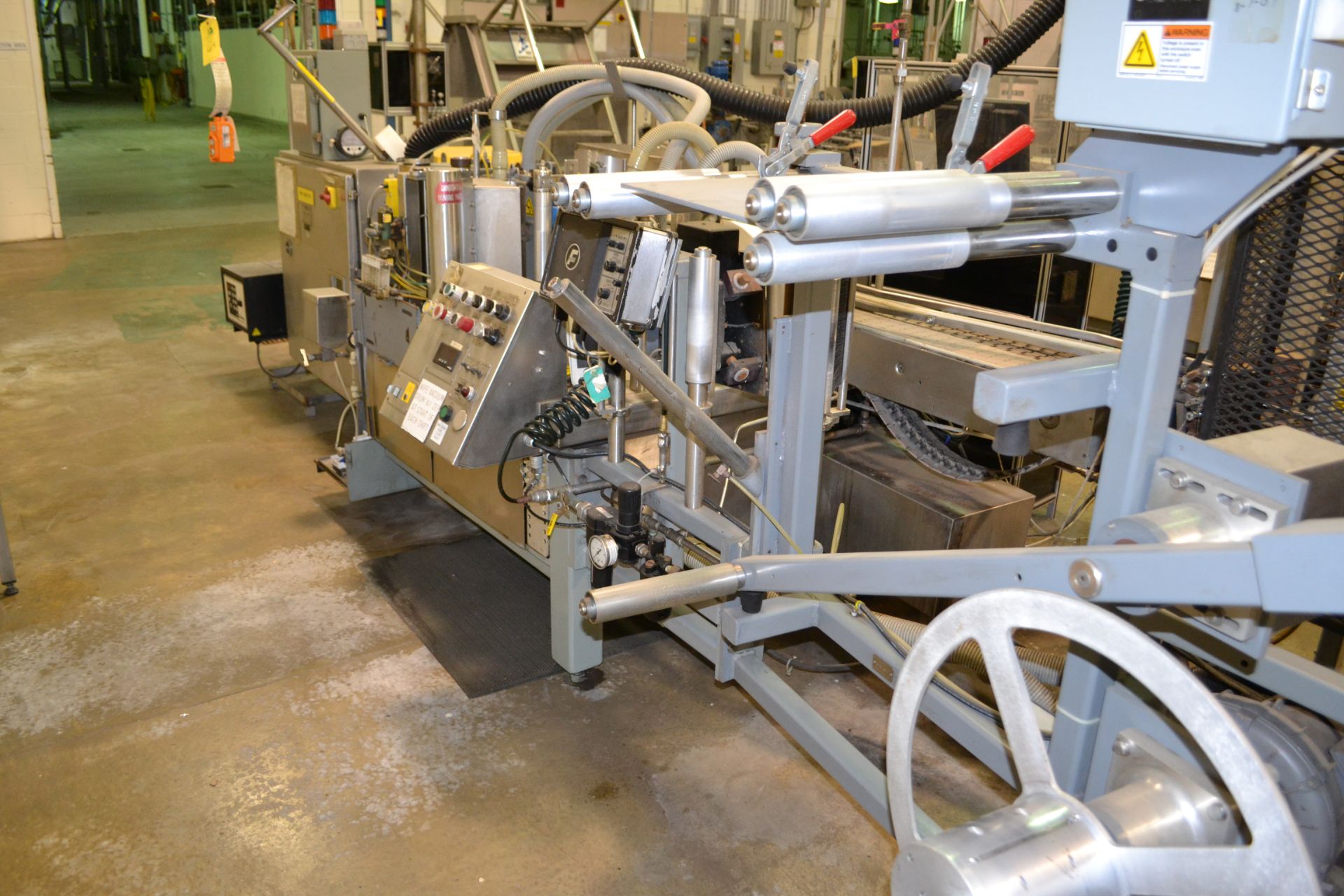 Trine model 5500G/S wraparound plastic film labeler, serial number 06955180, set up for a 211/ - Image 2 of 5