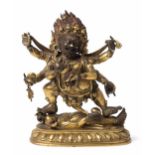 Mahakala Tibetochinesisch, 18./19.Jh. Feuervergoldete Bronze, tlw. rot gefasst. Der sechsarmige,