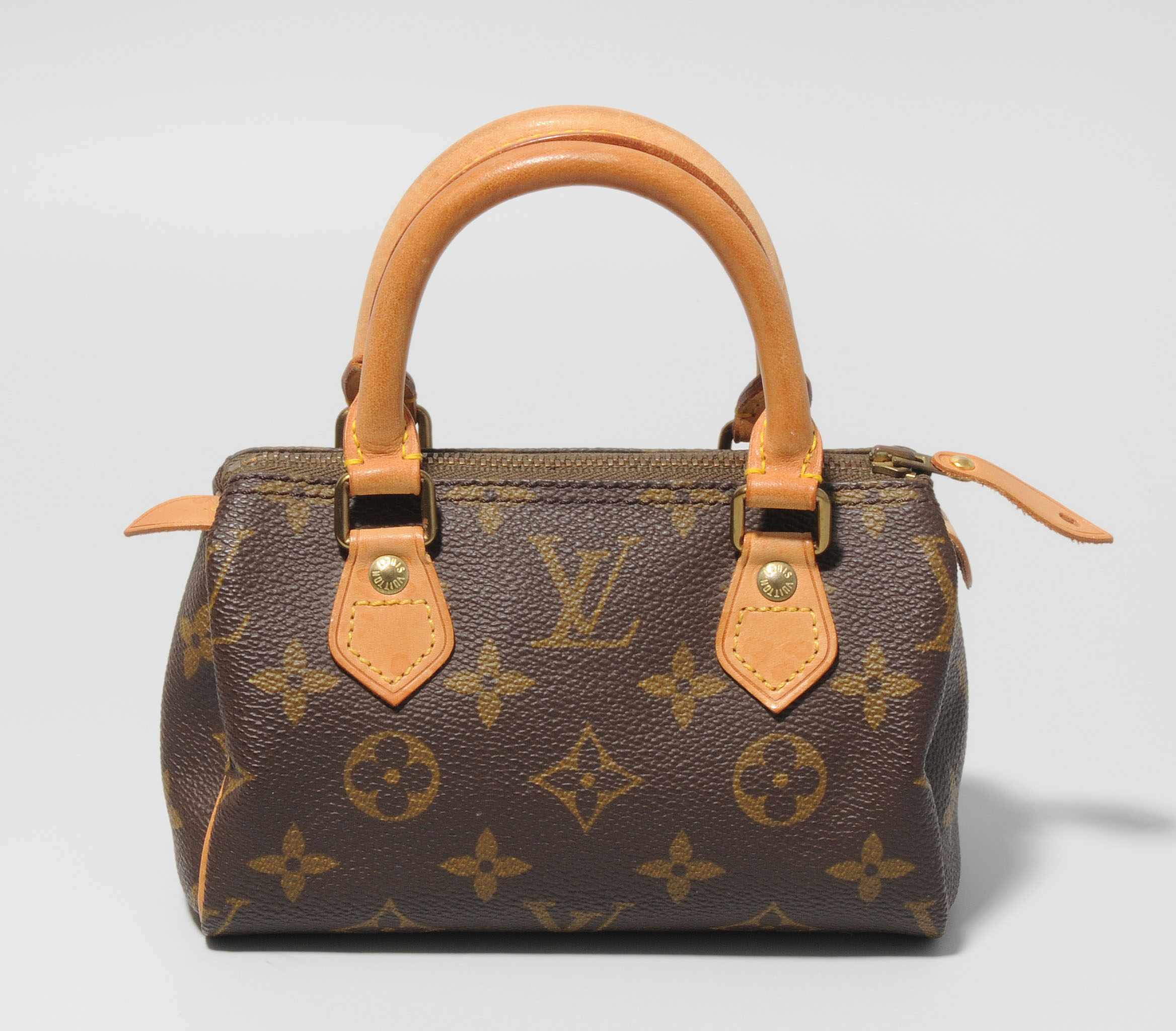 Louis Vuitton, Handtasche "Speedy Mini" Aus Monogram Canvas. Zwei Traggriffe. Reissverschluss.