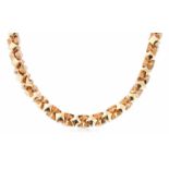 Bicolor-Collier Italien. 750 Gelb- und Rotgold. Moderne Kette. L 50 cm, 119,7 g.