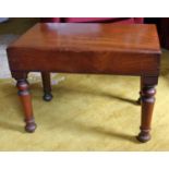 A Mid 19th Century Mahogany Commode Stool with box cover, with fitted creamware insert and on turned