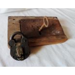 An Early 19th Century Door Lock & Key, together with an old padlock & key with brass escutcheon (2).