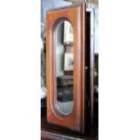 A Wall Hanging Mahogany Key Cabinet of neat proportions with mirrored front. 16 x 6.5ins.