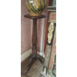 A Late 19th/Early 20th Century Mahogany Plant Stand on reeded bulbous column and well carved